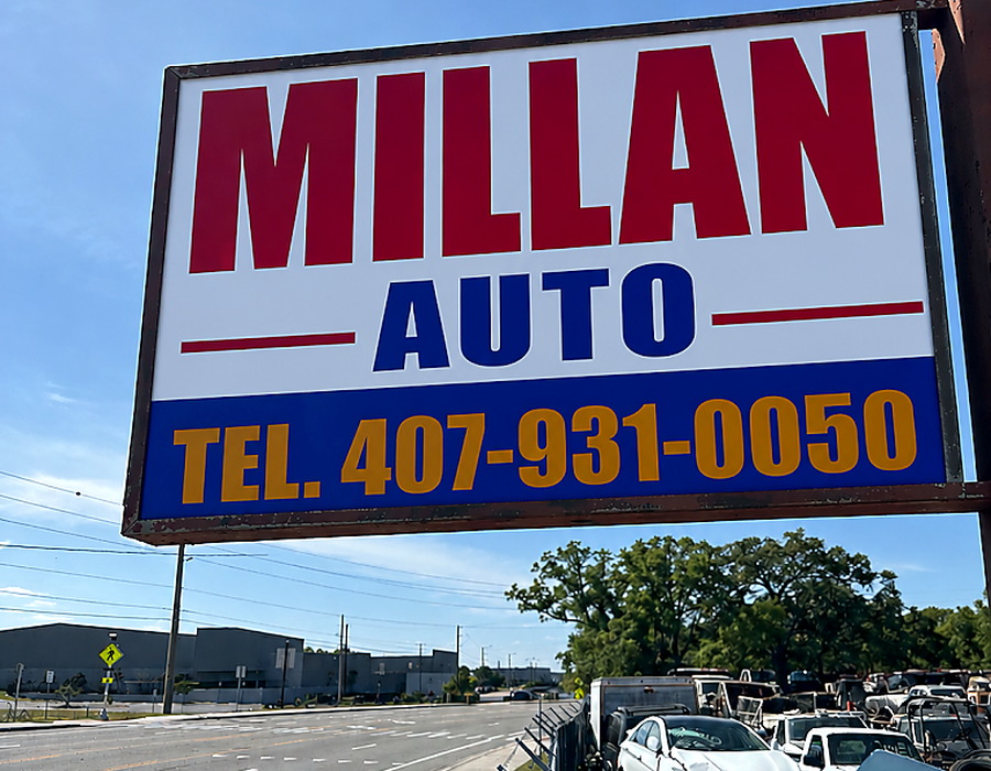 Millan roadside sign