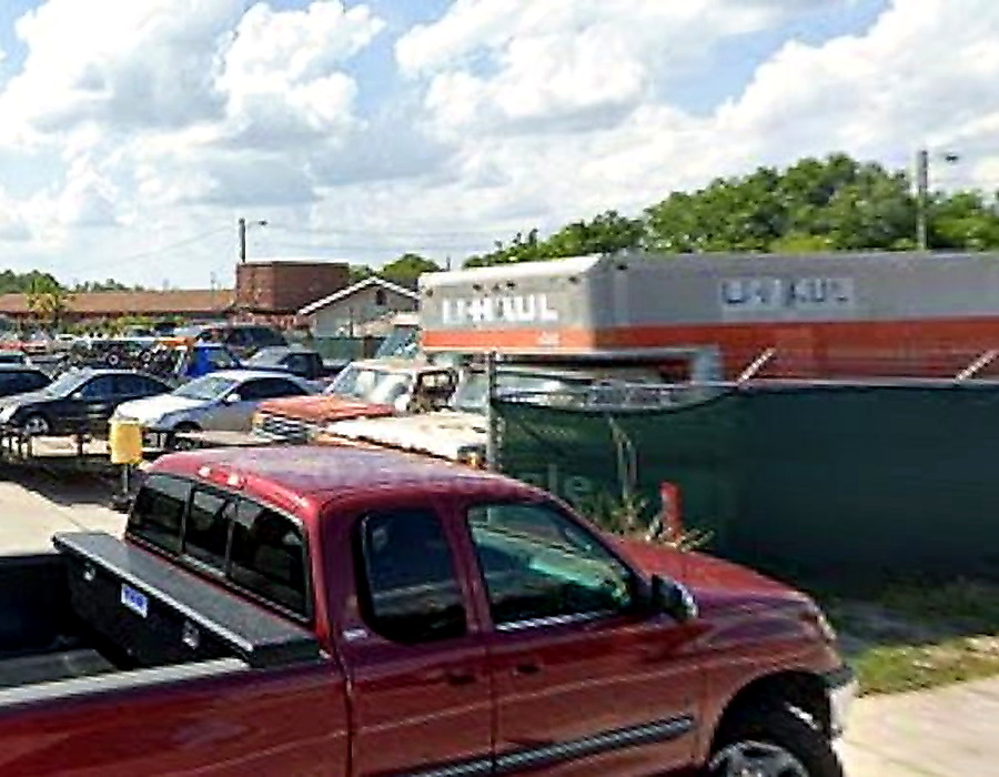 Millan salvage yard with vehicles